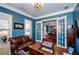 Well-appointed office with french doors, hardwood floors, and stylish decor at 2480 Copper Mill Trl, Cumming, GA 30041