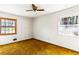 Bedroom featuring a ceiling fan and two windows for natural light at 3160 Ann Se Rd, Smyrna, GA 30080