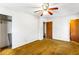 Bedroom featuring a ceiling fan and closet and door access at 3160 Ann Se Rd, Smyrna, GA 30080