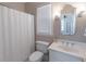 Bathroom with shower, toilet, vanity, sink and mirror at 4162 Gateswalk Se Dr, Smyrna, GA 30080