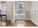 Stylish entryway with hardwood floors, neutral walls, and a bright white door with window at 4535 Atley Woods Se Dr, Atlanta, GA 30339