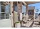 Cozy front porch with a chair and a side table, perfect for enjoying the outdoors at 4535 Atley Woods Se Dr, Atlanta, GA 30339