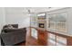 Inviting living room with hardwood floors, brick fireplace, and ample natural light at 848 Gateshead Ct, Lawrenceville, GA 30043