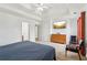 Serene bedroom with neutral decor, carpet, and a TV, offering a cozy space for relaxation at 848 Gateshead Ct, Lawrenceville, GA 30043