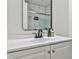 Modern bathroom featuring a sleek vanity and a shower with sliding doors at 3915 Basil Sw Way, Atlanta, GA 30331