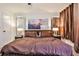 Inviting main bedroom featuring a comfortable bed, plush carpet, and stylish decor at 3915 Basil Sw Way, Atlanta, GA 30331