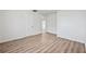 The bedroom features modern laminate flooring and neutral colored walls at 5153 Westbrook Pl, Union City, GA 30291
