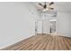 Bedroom featuring wood floors with doorways to the bathroom and additional rooms at 5153 Westbrook Pl, Union City, GA 30291