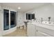 Bathroom and laundry area with glass enclosed shower, toilet, sink, and washer and dryer at 2441 Hidden Hills Dr, Marietta, GA 30066