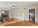 Bright living room featuring hardwood floors, a ceiling fan, and great natural light at 2441 Hidden Hills Dr, Marietta, GA 30066