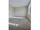 Bright bedroom with carpet, large window, and lots of space at 5550 Mccrossin Cir, Stonecrest, GA 30038