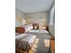 Cozy bedroom featuring two beds, carpet, and a window at 5550 Mccrossin Cir, Stonecrest, GA 30038
