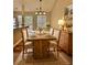 Charming dining space with a rustic table, elegant decor, and warm lighting creates a cozy atmosphere at 5550 Mccrossin Cir, Stonecrest, GA 30038