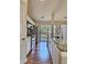The kitchen features granite countertops, white cabinets, and stainless steel appliances, with a view of the outdoors at 5550 Mccrossin Cir, Stonecrest, GA 30038