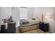 Bright bedroom with a comfortable bed, natural light, and neutral tones, creating a tranquil and restful atmosphere at 1280 W Peachtree Nw St # 2613, Atlanta, GA 30309