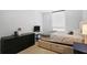 Relaxing bedroom featuring a comfortable bed, natural light, and convenient storage, providing a peaceful retreat at 1280 W Peachtree Nw St # 2613, Atlanta, GA 30309