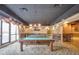 A billiards room with billiard tables, decorative carpeting, and natural light at 1280 W Peachtree Nw St # 2613, Atlanta, GA 30309