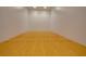 Interior view of racquetball court featuring wood floor and white walls at 1280 W Peachtree Nw St # 2613, Atlanta, GA 30309