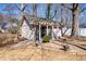An accessory dwelling sits in a luscious yard that has a stone walkway at 1341 Longwood Sw Dr, Marietta, GA 30008