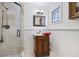 Bathroom featuring a glass enclosed shower and vanity at 1341 Longwood Sw Dr, Marietta, GA 30008