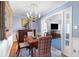 Formal dining room featuring a classic chandelier and hardwood floors at 1341 Longwood Sw Dr, Marietta, GA 30008