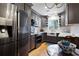 Updated kitchen featuring stainless steel appliances and a farmhouse sink at 1341 Longwood Sw Dr, Marietta, GA 30008
