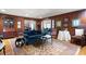 Spacious living room featuring wood floors, area rug, and neutral wall colors at 1341 Longwood Sw Dr, Marietta, GA 30008