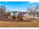 View of a single-story home with brick and siding, attached two-car garage, on a grassy lot at 1760 Campbell Ives Dr, Lawrenceville, GA 30045