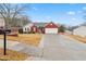 Single story home showcasing a brick and siding exterior, two-car garage and an inviting front yard at 1760 Campbell Ives Dr, Lawrenceville, GA 30045