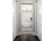 Luxurious bathroom with a freestanding tub, modern fixtures, and stylish gray flooring at 3280 Stillhouse Se Ln # 101, Atlanta, GA 30339