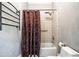 Cozy bathroom showcasing a shower-tub combo, towel warmer, and neutral design palette at 3280 Stillhouse Se Ln # 101, Atlanta, GA 30339