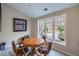 Community game room with a round table and 4 chairs, a large window at 3280 Stillhouse Se Ln # 101, Atlanta, GA 30339