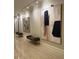 Elegant hallway featuring modern artwork and seating at 3280 Stillhouse Se Ln # 101, Atlanta, GA 30339