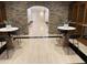 Lobby area with stone wall, black accents, and cozy seating at 3280 Stillhouse Se Ln # 101, Atlanta, GA 30339