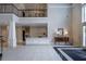 Spacious lobby area with elegant columns and tile flooring at 3280 Stillhouse Se Ln # 101, Atlanta, GA 30339
