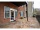 Large covered patio featuring a stone floor and exterior access at 3280 Stillhouse Se Ln # 101, Atlanta, GA 30339