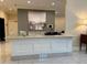 Well-lit reception desk area with marble countertops and neutral color scheme at 3280 Stillhouse Se Ln # 101, Atlanta, GA 30339