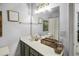 Bathroom featuring a large mirror and vanity at 9390 Knollcrest, Alpharetta, GA 30022