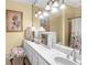 Bathroom featuring a large mirror, vanity, and elegant decor at 9390 Knollcrest, Alpharetta, GA 30022