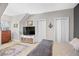 Bedroom featuring two closets, a TV, and a bed at 9390 Knollcrest, Alpharetta, GA 30022