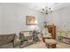 Bedroom with a chandelier, crib, glider, and decor at 9390 Knollcrest, Alpharetta, GA 30022