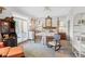 Bedroom with a four-poster bed, rocking chair, and view to the patio at 9390 Knollcrest, Alpharetta, GA 30022