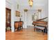 Elegant foyer featuring hardwood floors, decorative columns, and ornate furnishings at 9390 Knollcrest, Alpharetta, GA 30022