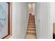 Stairway featuring neutral carpet and white walls at 9390 Knollcrest, Alpharetta, GA 30022