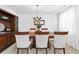 Dining room features a large wooden table, six chairs, a china cabinet and neutral decor at 5330 Willow Park Blvd, Atlanta, GA 30349
