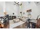 Spacious living room featuring hardwood floors, a fireplace, and large windows for ample light at 5330 Willow Park Blvd, Atlanta, GA 30349