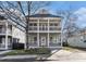 Charming two-story home with a welcoming front porch and classic architectural details at 970 Welch Sw St, Atlanta, GA 30310