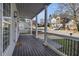Inviting front porch featuring elegant columns, offering a perfect spot for relaxing outdoors at 970 Welch Sw St, Atlanta, GA 30310