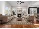 Bright living room with hardwood floors, fireplace, and large windows filling the space with natural light at 970 Welch Sw St, Atlanta, GA 30310