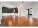 Open-concept living area with hardwood floors and stylish archways at 970 Welch Sw St, Atlanta, GA 30310